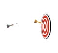 Dartboard with Darts, three typical dart arrows center shot Royalty Free Stock Photo